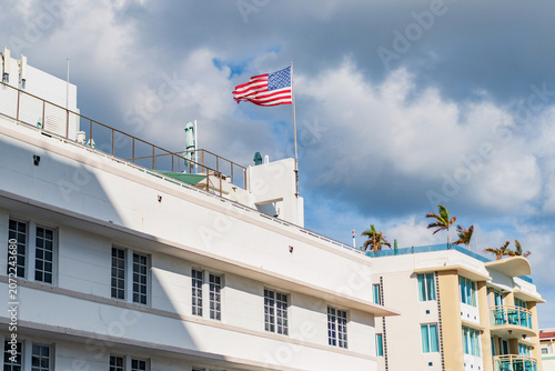 Ocean drive. Miami Beach in Ocean Drive Florida. Art Deco building architecture. Architectural building. Art deco. Architectural district Art Deco. Modern building of Miami beach with USA flag
