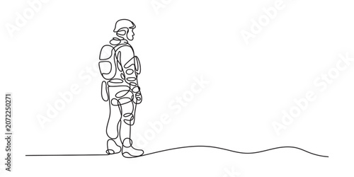Foto Continuous line drawing of a military soldier standing with a backpack and helme