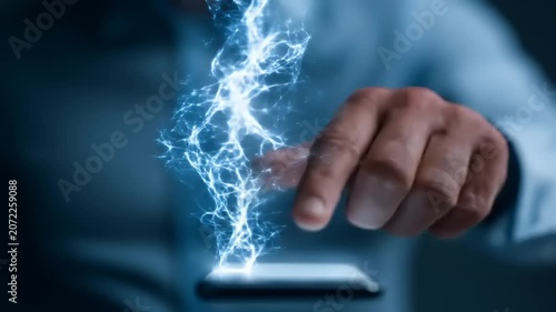 Person interacting with a glowing energy display on smartphone screen