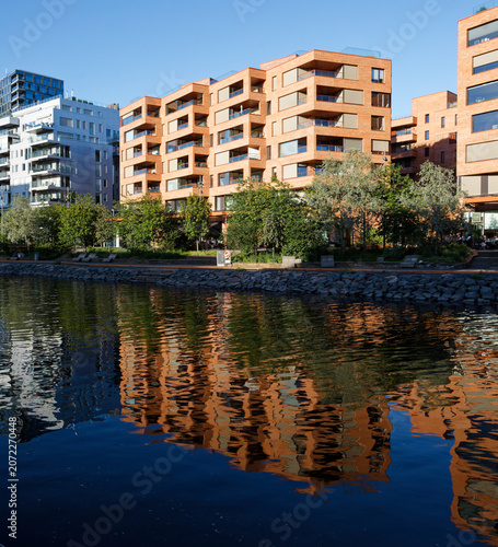Modern Waterfront Architecture Reflected in Calm Waters