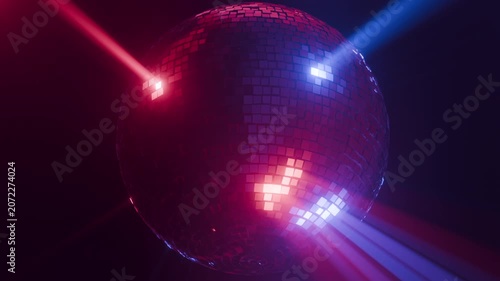 Intense spinning disco ball in fog colorful rays 3d seamless loop animation