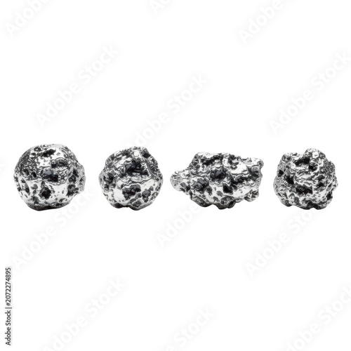 Four raw silver nuggets arranged in a horizontal row featuring detailed metallic textures and jagged facets against a transparent background, minimalist luxury