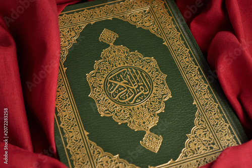 The Quran Green book Gold Calligraphy