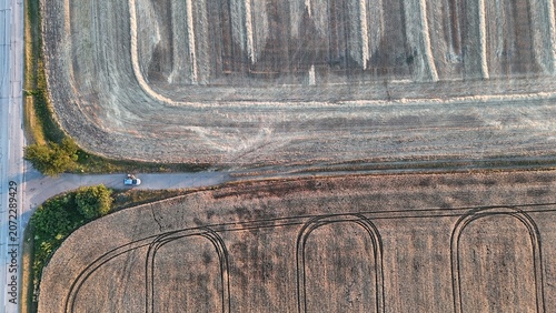 Canvastavla Drone view of harvested wheat fields at sunset near Baracs