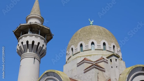 Grand mosque of constanta dome and minaret in romania. Architectural details of the grand mosque of constanta, also known as the carol i mosque, featuring the impressive dome and minaret