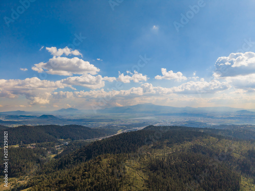 Sky, clouds, and mountains