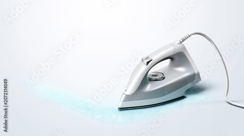 Modern electric iron with blue glow on minimalist background