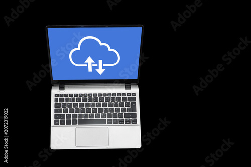 Cloud storage symbol shows upload and download icons on laptop screen in bright blue color against black background
