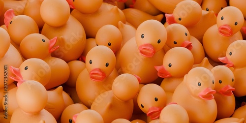 Photography 3d rubber ducks in a pile, yellow rubber duck