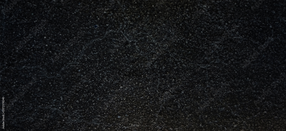 Fototapeta premium Black granite texture background, polished dark marble stone surface, elegant charcoal mineral grain for luxury interior design and architectural backdrop