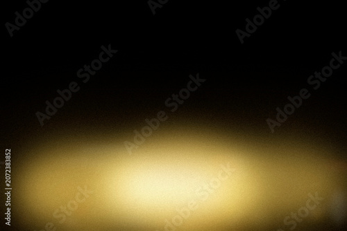 Obraz na plátně A soft golden halo glow spreads across a deep dark field, creating a dramatic spotlight effect that fits headlines, stage concepts, and moody branding