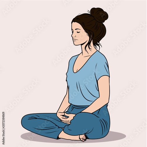 Woman meditating in seated yoga pose with eyes closed