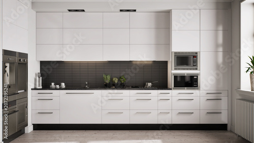 Tableau sur toile Modern kitchen interior with white cabinets, black tiled backsplash and stainless steel appliances including built-in ovens and microwave
