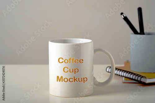 Photos Blank White Coffee Cup Mockup for Custom Print and Merchandise Design