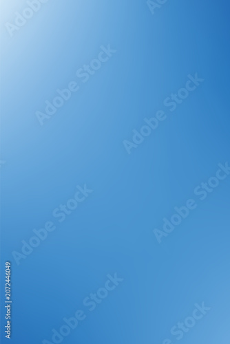 Smooth gradient of bright blue sky with subtle white light effect