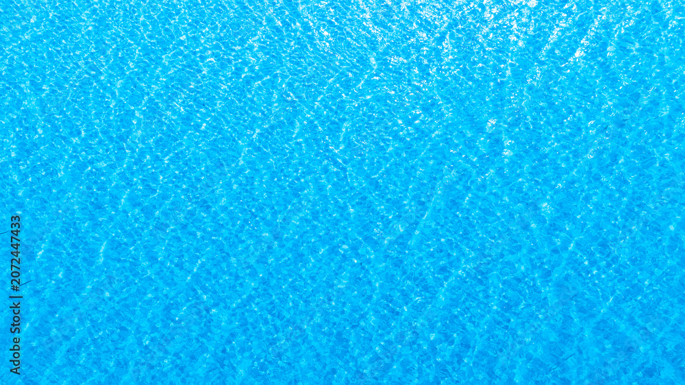 Fototapeta premium Title Top view of deep blue sea water surface with small ripples, aerial drone shot of turquoise ocean texture at island , abstract nature background 