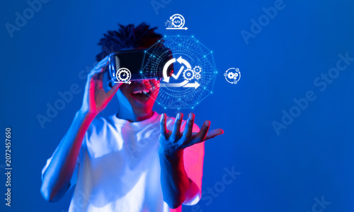 A young individual immersed in virtual reality, showcasing the excitement of agile business methodologies through innovative technology and interactive graphics. XDMCP