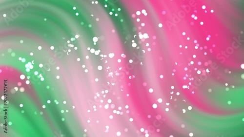 Abstract composition featuring pink and green flowing waves with glowing sparkles and light particles, suitable for modern design projects.