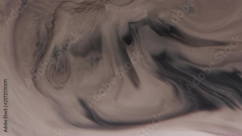 Acrylic waves. Liquid marble. Defocused white dark black paint texture in water chemical ink flow on abstract art creative background.