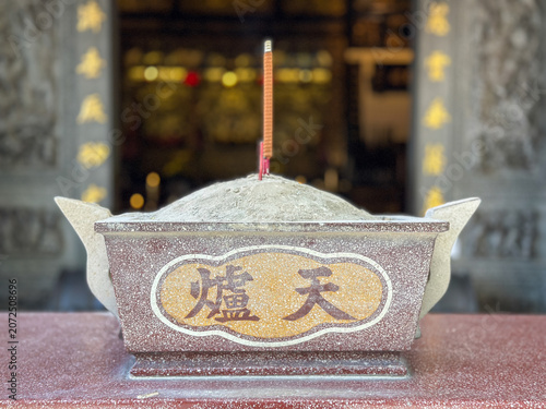 Incense stick in front of Fu De Zhen Shen temple in George Town on Penang Island, Malaysia