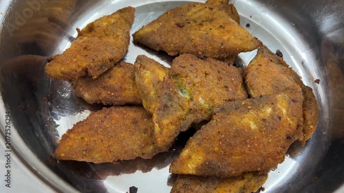 Bengali style fish fry served with kasundi mustard; professional food photography of traditional Kolkata street food, crispy breaded fish cutlet, non-veg appetizer, and popular Indian snack.