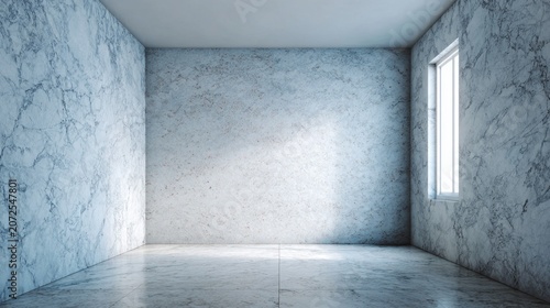 Empty room with marble walls, concrete floor, and natural light from window.