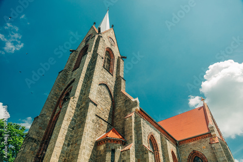 Φωτογραφία Wide angle of 19th century Catholic Christian stone church, Europe, Poland