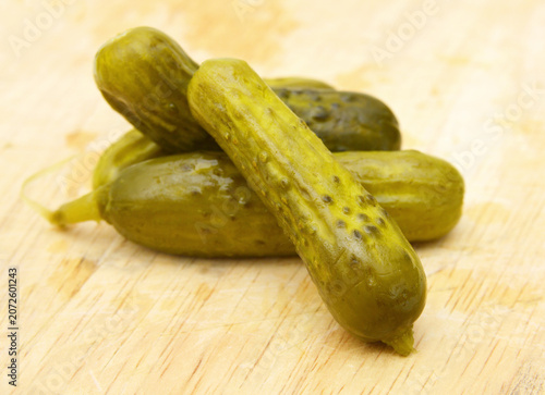 Fresh sliced green pickles isolated over white 