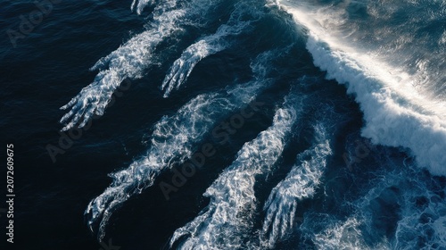 Swirling aquatic forms emerge from the dark ocean depths, creating an ethereal scene