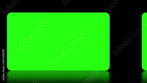 Hand swiping and tapping on a green screen interface isolated on a reflective black background