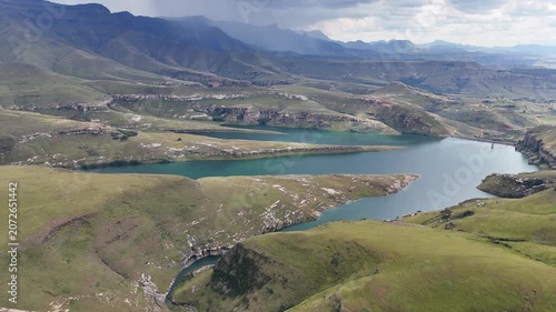 Aerial View South Africa Reservoir Under Brewing Storm Clouds Dramatic Overcast Sky Rolling Mountain Ridges