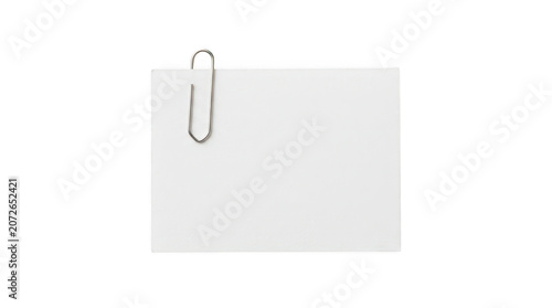 Blank white note paper with a metal paper clip isolated on transparent background