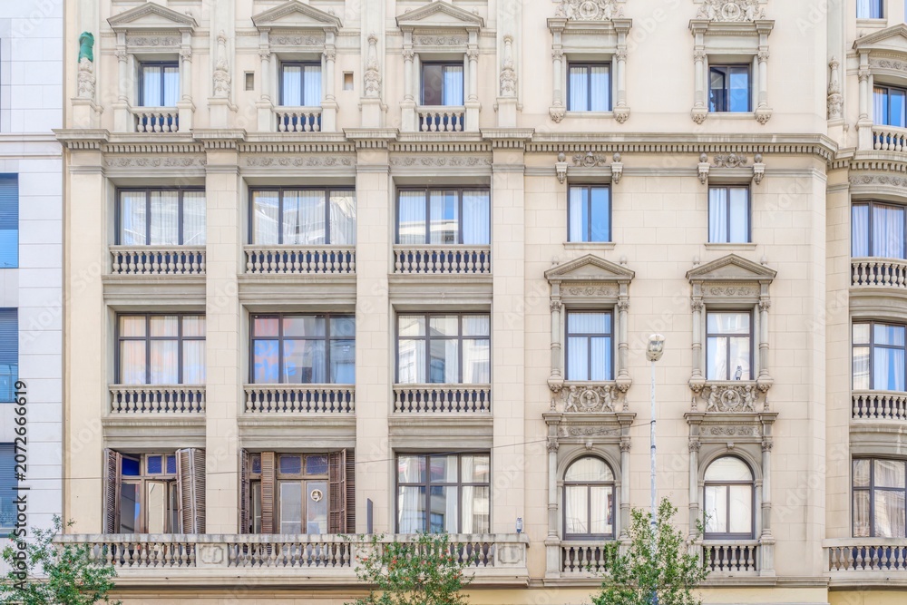 Fototapeta premium Classical Architecture Facade with Ornate Windows and Stone Balustrades, Building Exterior, Front Residential View