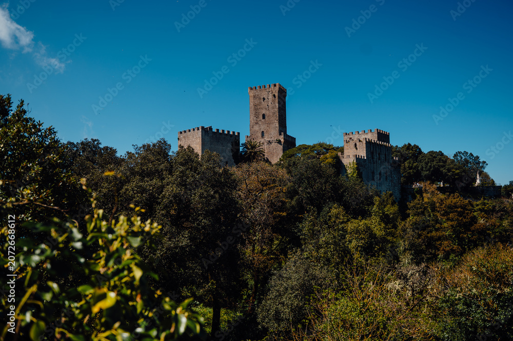 Naklejka premium Castello di Venere rising above woodland in Erice, Sicily