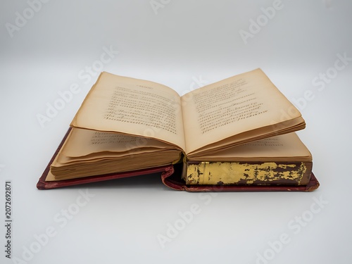 Open Old Book with Gold Embossed Leather Cover
