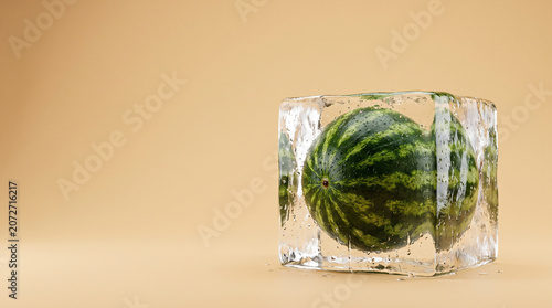 Frozen Whole Watermelon Encased in Clear Ice Cube on Beige Background
