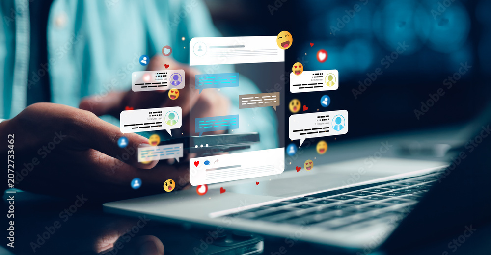 Fototapeta premium Social media engagement concept with chat notifications, emoji reactions and online communication on laptop for digital marketing strategy.