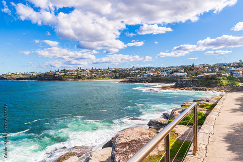 Tamarama Coastal view showcasing the turquoise ocean with iconic Australian beaches and luxury residential houses along the rugged shoreline, Sydney, Australia