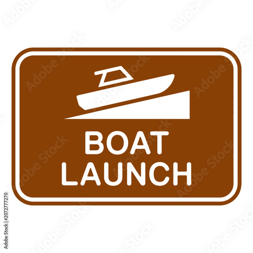Brown boat launch area directional sign with nautical navigation recreation transport