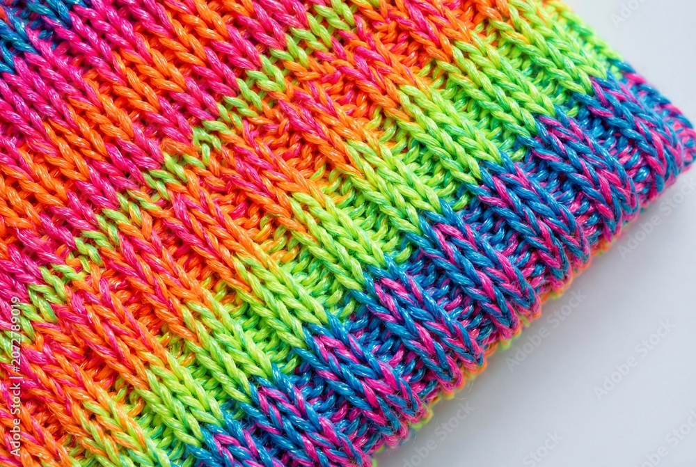 Obraz premium Top-Down Macro of Neon Pop-Art Style Synthetic Knitted Rows