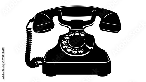 Φωτογραφία Vintage Rotary Phone: A classic black rotary telephone, representing a bygone era of communication, stands ready to connect