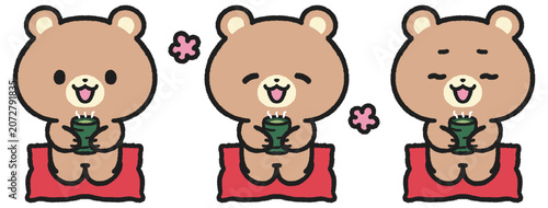 Fotografie 座布団に座りお茶を飲むクマのイラストセット