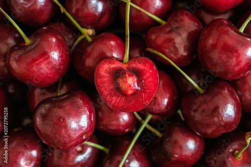 Fresh red cherries close up background