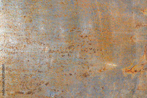 The texture of rusty metal.The appearance of corrosion on the iron surface.The old iron background for the text.
