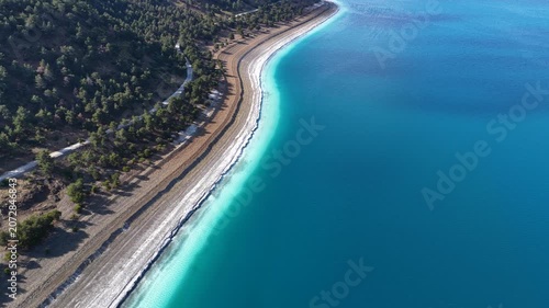 A breathtaking aerial view of Lake Salda’s deep turquoise waters and white sandy beach. “Turkey’s Maldives” is a unique natural wonder.