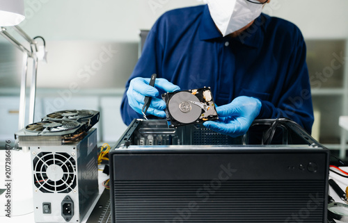 Canvastavla Showcasing expert computer hardware assembly and hard drive installation with precision and advanced technology for IT and electronics enthusiasts