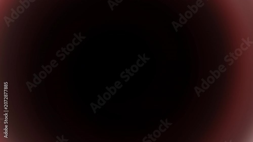 Red black round mesmerizing spiral gradient background featuring smooth circular motion and bold abstract depth