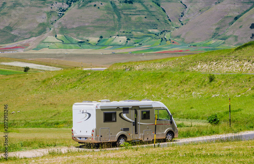 Motor home o camper van at beautiful panoramic road. Travel adventure vacation.	