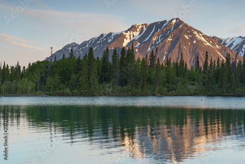 Morning reflection of mountains on Kathleen Lake in Kluane National Park, Yukon, Canada