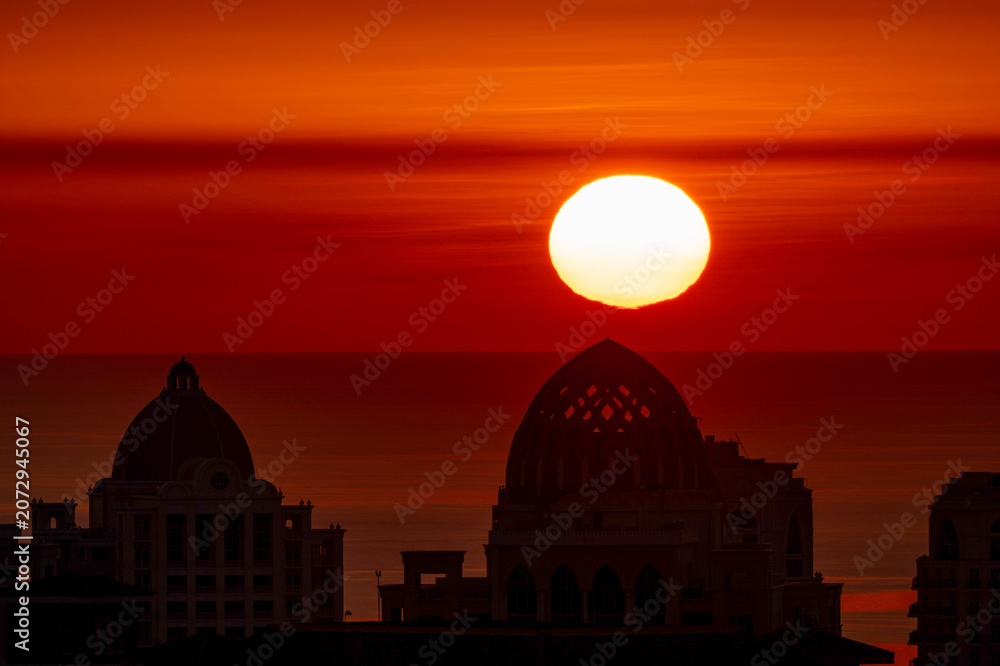Obraz premium Sunrise Aerial view of Porto Arabia Peral Qatar. Artificial island 